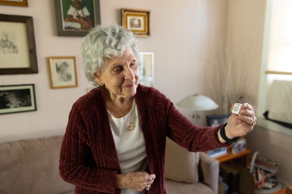 Helen shows off her favorite mahjong tile. 