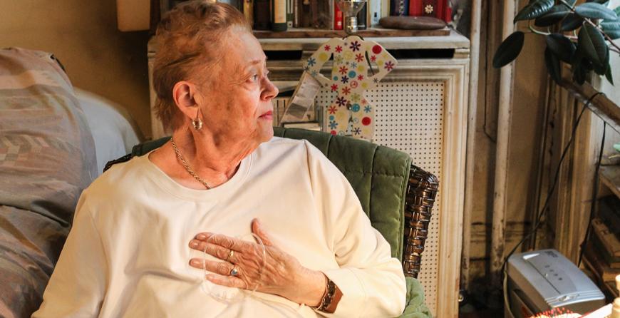 An elderly Citymeals (meals on wheels) recipient shelters from a heat wave in her NYC apartment.