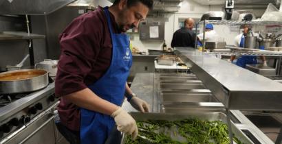 A cook making asparagus 