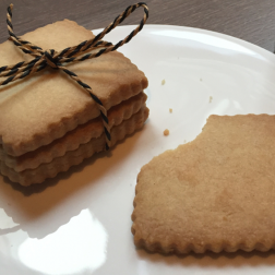 Pumpkin shortbread cookies on a white plate