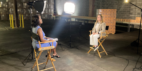 Citymeals CEO Beth Shapiro interviewed for a local news program. 